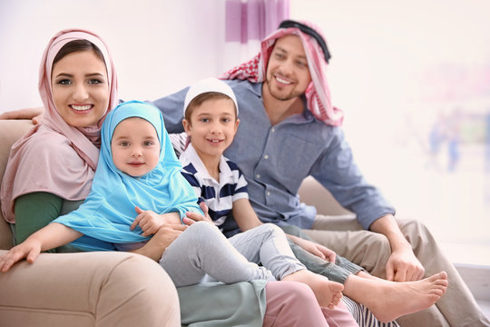 Happy Muslim family at home