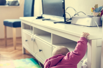 Baby exploring living room.