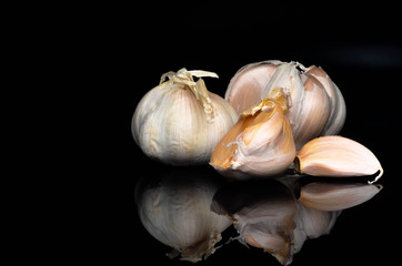 Garlic on a black background.