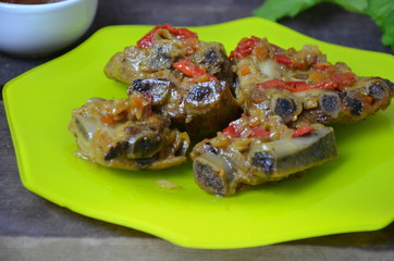mutton grill with sauce on the green plate