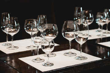 empty glasses of different shapes served for a wine tasting