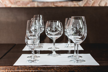 empty glasses of different shapes served for a wine tasting