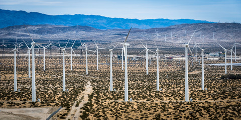 Wind turbine power generating farm on a sunny day in Riverside County, California