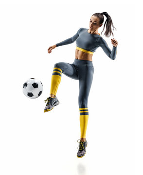 Football soccer player in action. Photo of sporty woman in sportswear isolated white background. Dynamic movement.