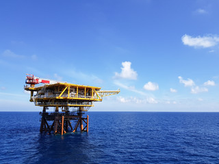A newly installed oil and gas production jacket with blue sky as background.