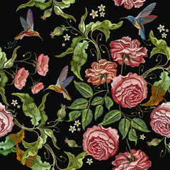 Roses embroidery seamless pattern. Classical embroidery buds of roses and humming birds on black background. Fashionable template, tapestry flowers renaissance style