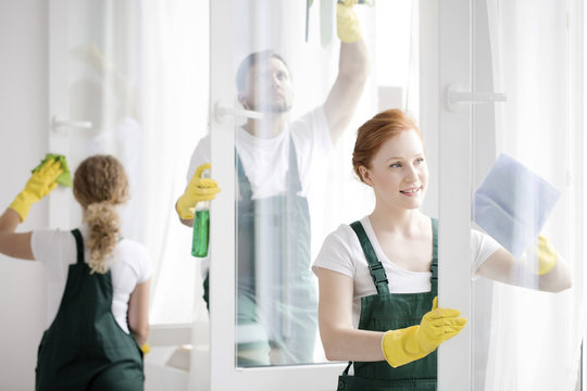 Team Cleaning Office Windows