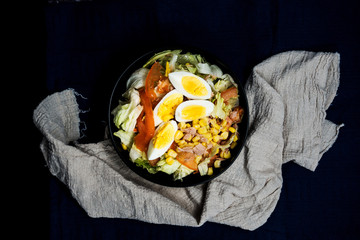Delicious fresh salad and olive oil