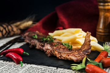 juicy steak veal beef meat with tomato and vegetables