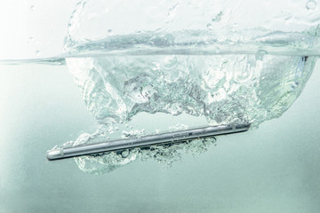 Smartphone fall in water.