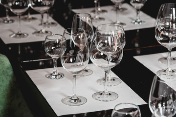 empty glasses of different shapes served for a wine tasting