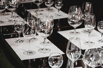 empty glasses of different shapes served for a wine tasting