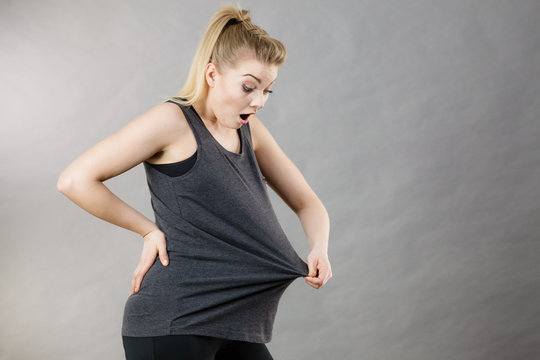 Woman wearing too big tshirt