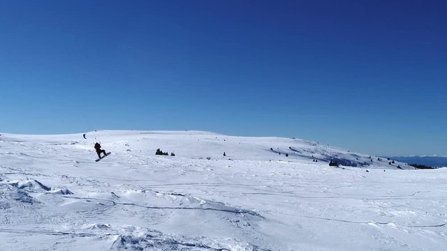 Snow kite as extreme and fun sport. Jumps and tricks