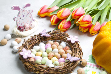 Easter decoration, Easter eggs and tulips.