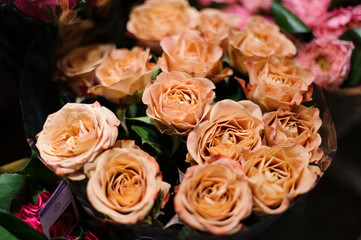 Bouquet of flowers consisting of tender orange roses
