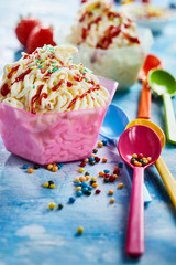 Cups of spaghetti ice cream raspberry dessert