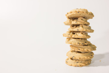 Closeup stack of cookies isolated on white background.