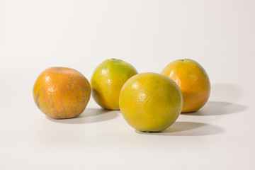Group of ripe orange on white background.