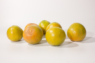 Group of ripe orange on white background.