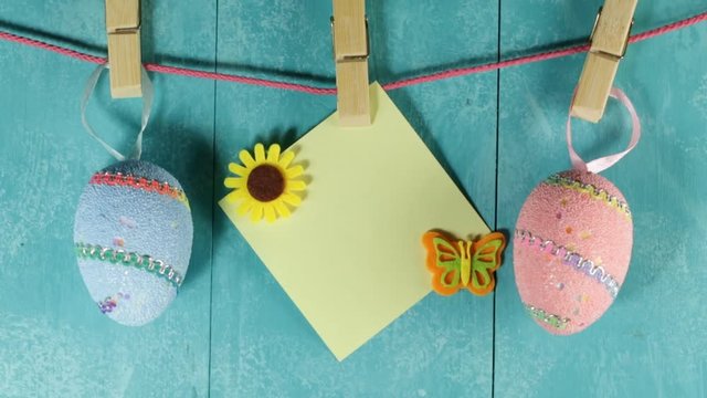 Background for easter eggs from blue rustic boards, eggs and cards
