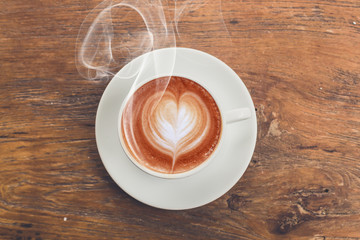 hot cup of coffee on table