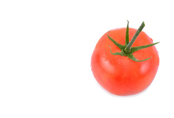 Closeup of tomatoes on the vine isolated on white