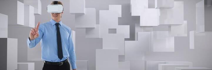 Composite image of young businessman gesturing using wearable