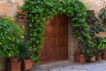 Beautiful medieval town of narrow streets and charming porch in Pienza,Italy