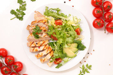 fried chicken sliced and salad