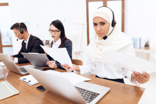 An Arab Woman Works In A Call Center.