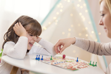 Playing a ludo game © Impact Photography