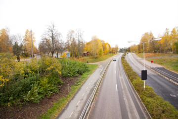 An autumn road in Finland, top view.