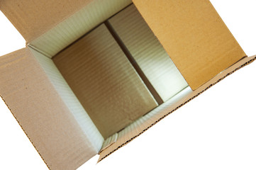 Cardboard box made of corrugated cardboard for packing different things on a white background