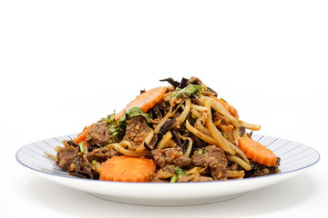 fried beef noodle food on the table