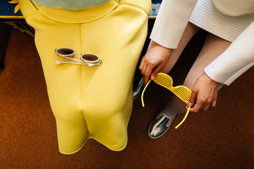 yellow glasses and skirt