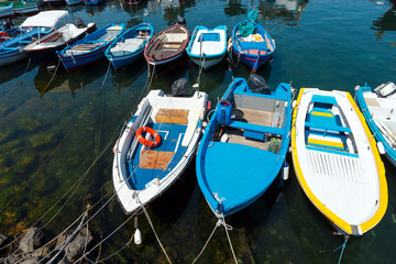 Fototapeta na wymiar Aci Trezza Marina dei Ciclopi boats harbor, Sicily