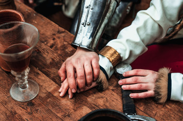 man holds woman by the hand