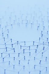 A large grid of pins connected with string. Communication, technology, network concept
