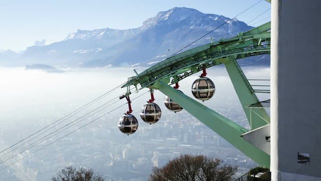 Image  of aerial view of Grenoble with French Alps and cable car, France