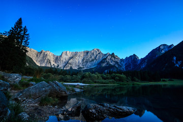 Naklejka premium Sunset at the lake of Fusine, Italy