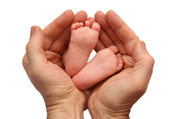 tiny little feet оn white isolated background