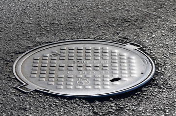 The hatch on the cobbled street.