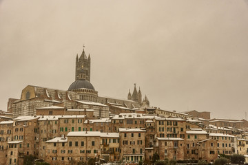 Obraz premium View of Siena in winter during a snowfall