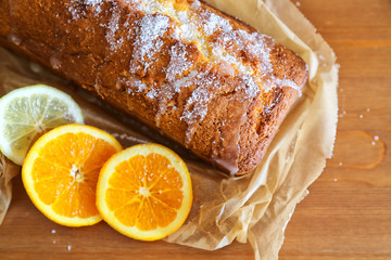 Orange cake on the wooden background