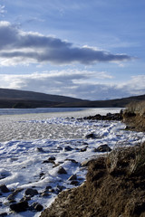 Fototapeta na wymiar Ice forming at Loch Fada
