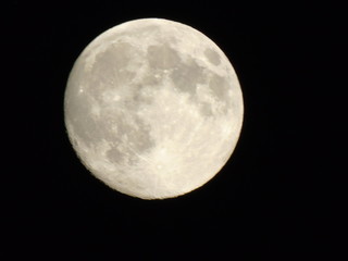 Amazing full moon over the city of Genova in winter days
