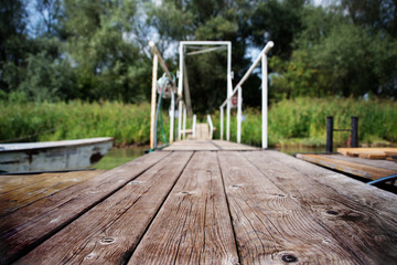 Fototapeta na wymiar Wooden dock on the river