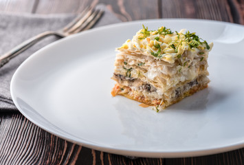 Fish pie with a dough, egg and fresh herbs
