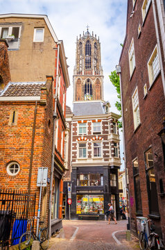 Traditional old buildings and tower of the Dom cathedral in Utrecht, Netherlands.